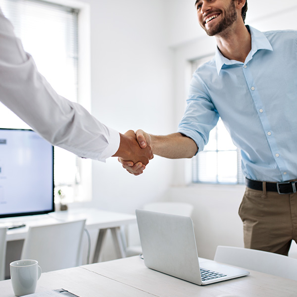 two men shaking hands